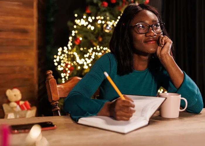 woman reflecting on the year.